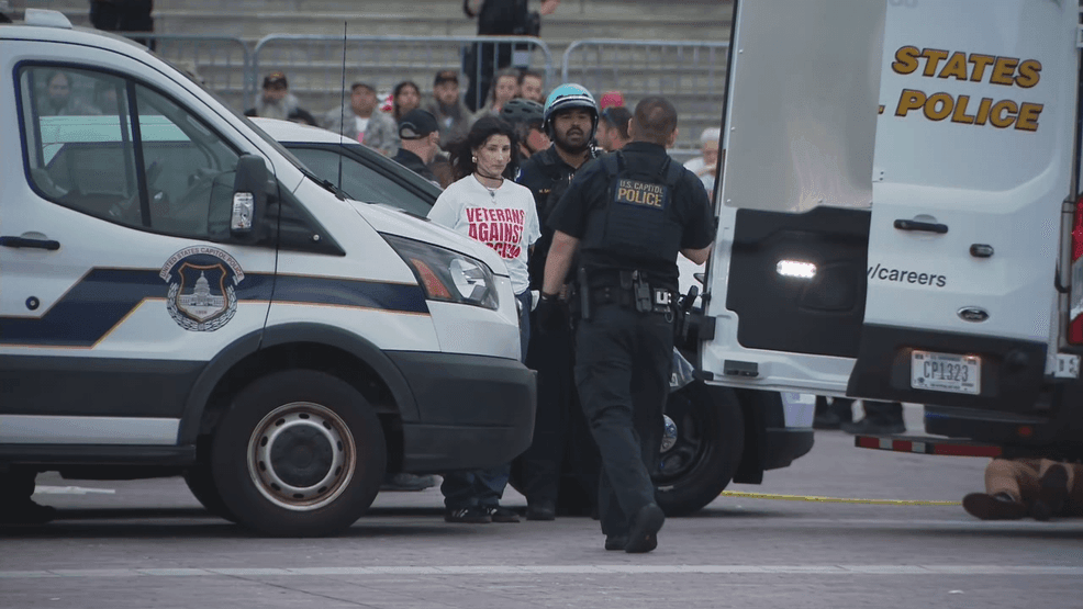 Protesters challenge military display outside US Capitol with 60 arrests